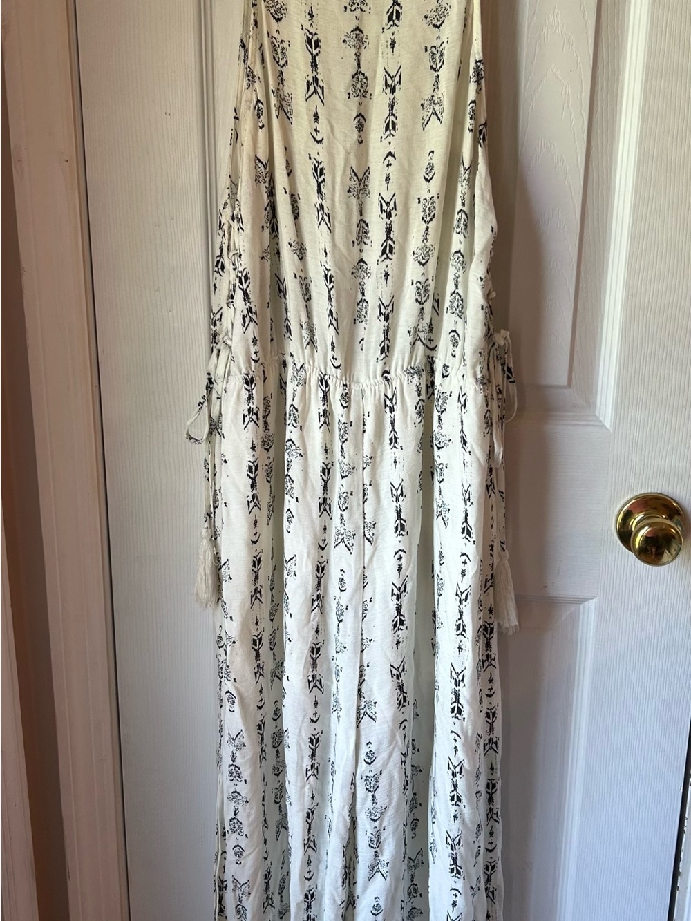 Lunik Cream Romper with Black Motif